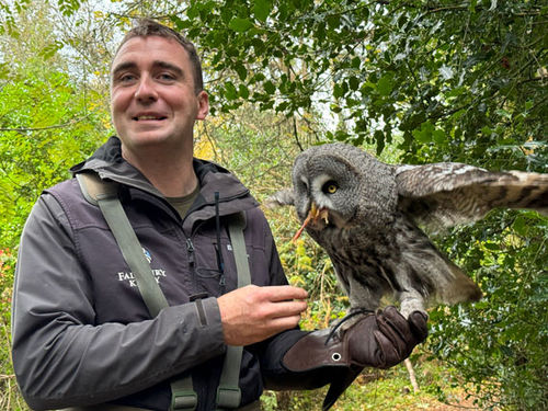 Falconer Liam Regan presents his great grey owl, which will perch on each guest’s wrist in turn. Falconer Liam Regan presents his great grey owl, which will perch on each guest’s wrist in turn.