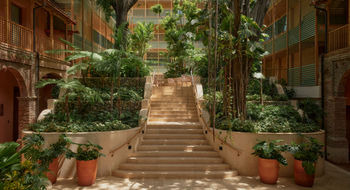 The Kimpton Las Mercedes was built into the bones of a 16th-century structure, though a new addition has been built behind its historic facade.