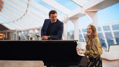 Drew Barrymore and Orlando Bloom play vacationers aboard the MSC World America who have commandeered the piano in the MSC Yacht Club's Top Sail Lounge.