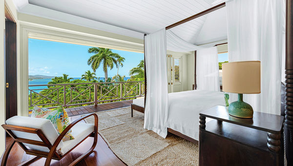 One of Villa 14's bedrooms, which has a chic Caribbean decor. One of Villa 14's bedrooms, which has a chic Caribbean decor.